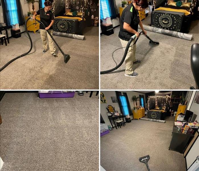 SERVPRO employee cleaning carpet
