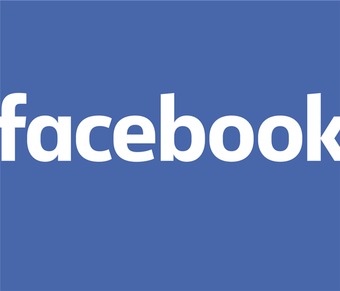 The facebook wordmark on a blue background.